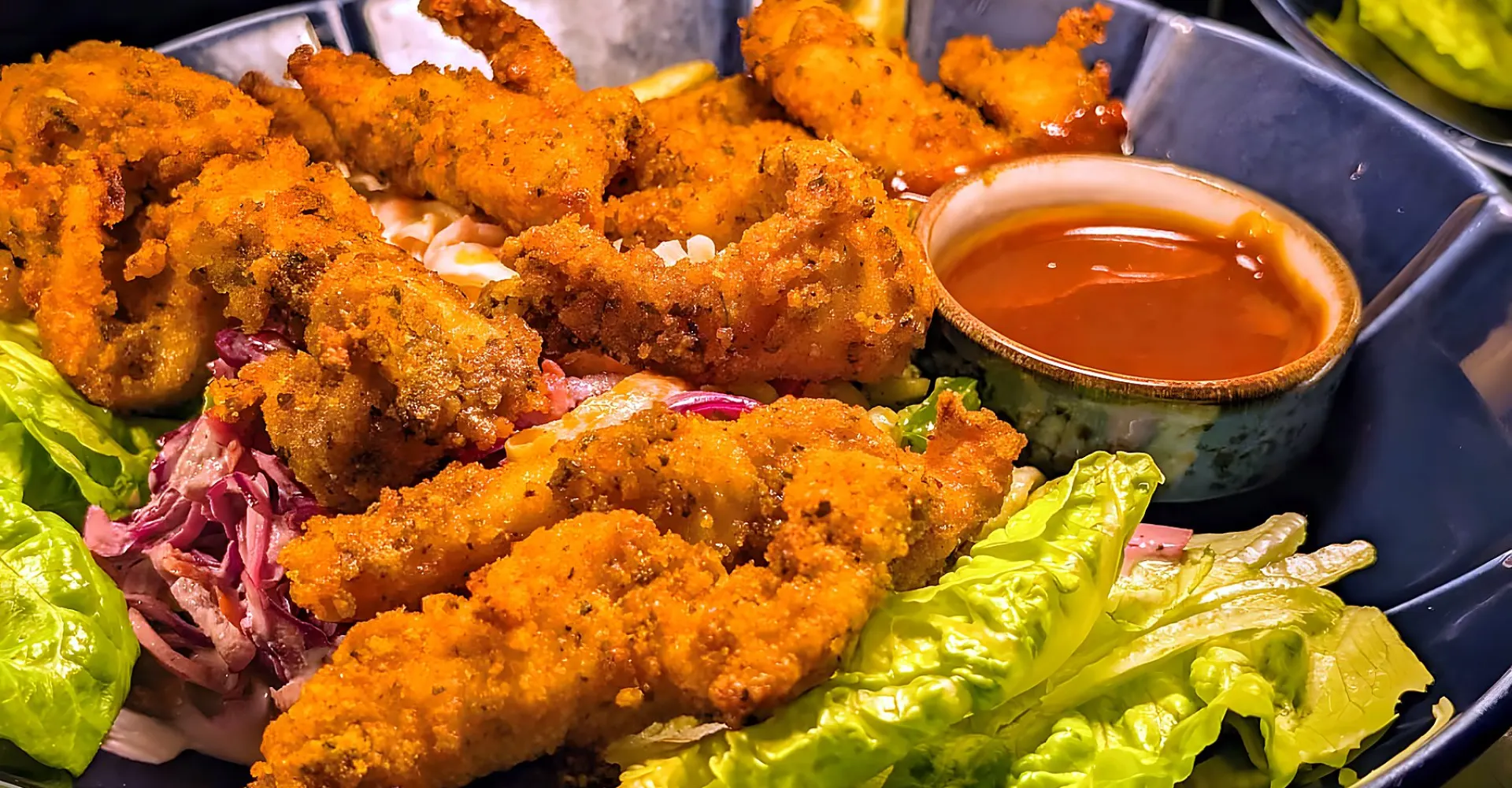 Crispy chicken goujons with slaw, chips and a dipping sauce