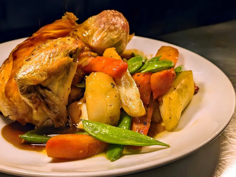 Roast of the day with root vegetables and gravy