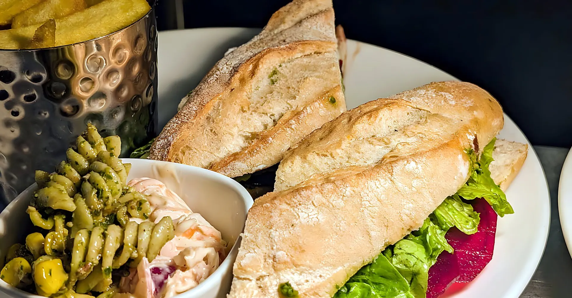 Ciabatta sandwich with pesto pasta salad