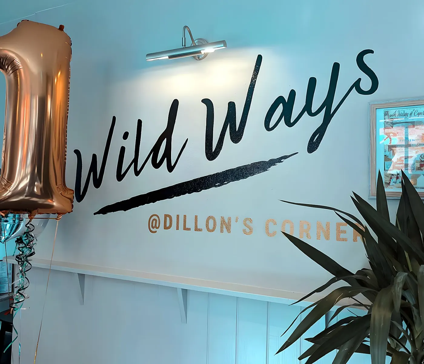 The Wild Ways sign painted on the restaurant wall